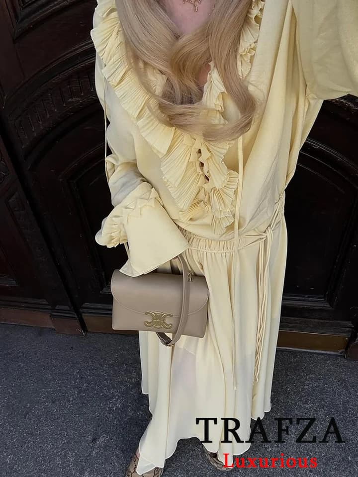 Dámská vintage halenka se šněrováním - žlutá s volánky a dlouhým rukávem V výstřih