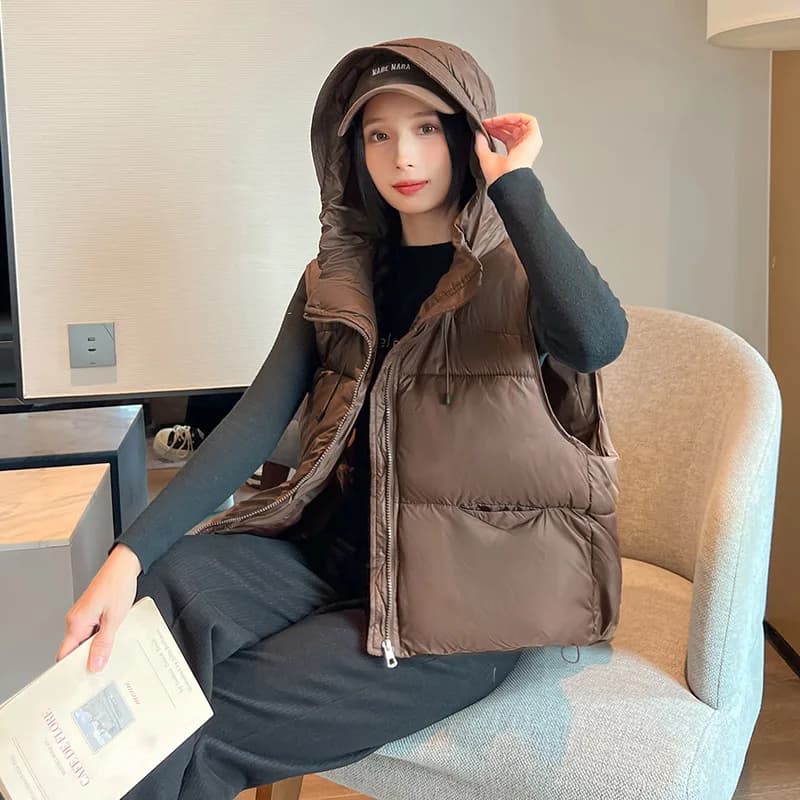 Dámská prošívaná vesta bez rukávů - lehká crop péřová vesta do pasu