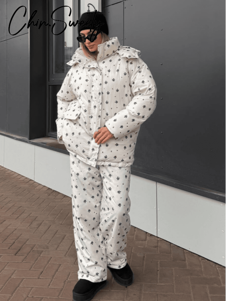 Dámský zimní elegantní set bunda s kapucí a široké kalhoty se zipy a kapsami