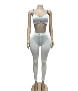 Dvoučástová sportovní souprava pro ženy crop top s tenkými ramínky a úzkými nohavicemi letní 2025 - náhled 6